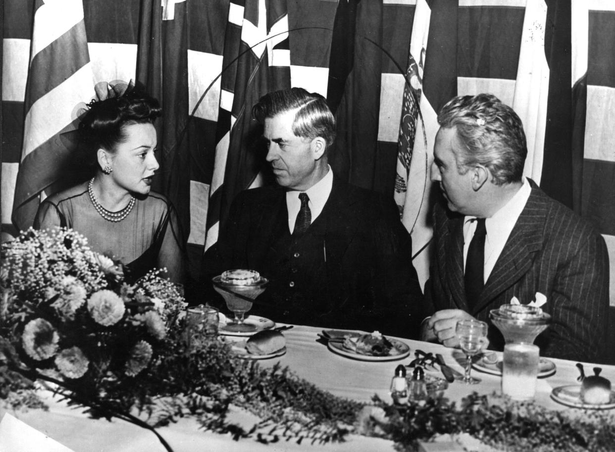 Henry A. Wallace on an evening out with film star Olivia De Havilland and screenwriter Dudley Nichols.