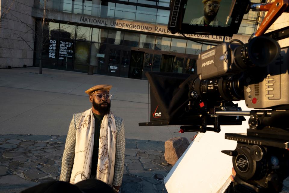 Kortney Jamaal Pollard, who performs under the stage name Mali Music, is filmed during a scene of “Black History Honors” at the National Underground Railroad Freedom Center in January.