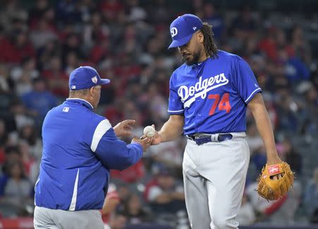 Mar 24, 2019; Anaheim, CA, USA; Los Angeles Dodgers reliever Kenley Jansen (74) is removed by manager Dave Roberts in the eighth inning against the Los Angeles Angels at Angel Stadium of Anaheim. Mandatory Credit: Kirby Lee-USA TODAY Sports