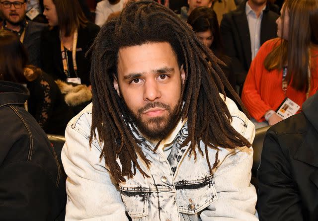 <p>Kevin Mazur/Getty</p> J. Cole attends the 69th NBA All-Star Game on February 16, 2020 in Chicago, Illinois.