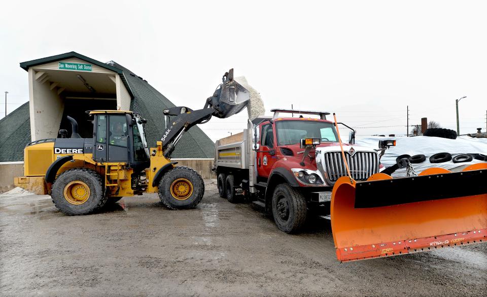 A dump truck gets filled with salt Monday, January 8, 2023 at the Public Works dept. in preparation for expected snow.
