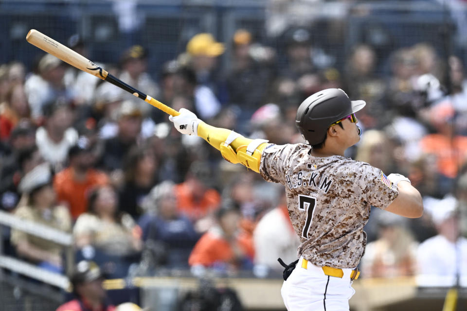 San Diego Padres' Ha-Seong Kim watches his three-run home run against the San Francisco Giants during the second inning of a baseball game Sunday, March 31, 2024, in San Diego. (AP Photo/Denis Poroy)