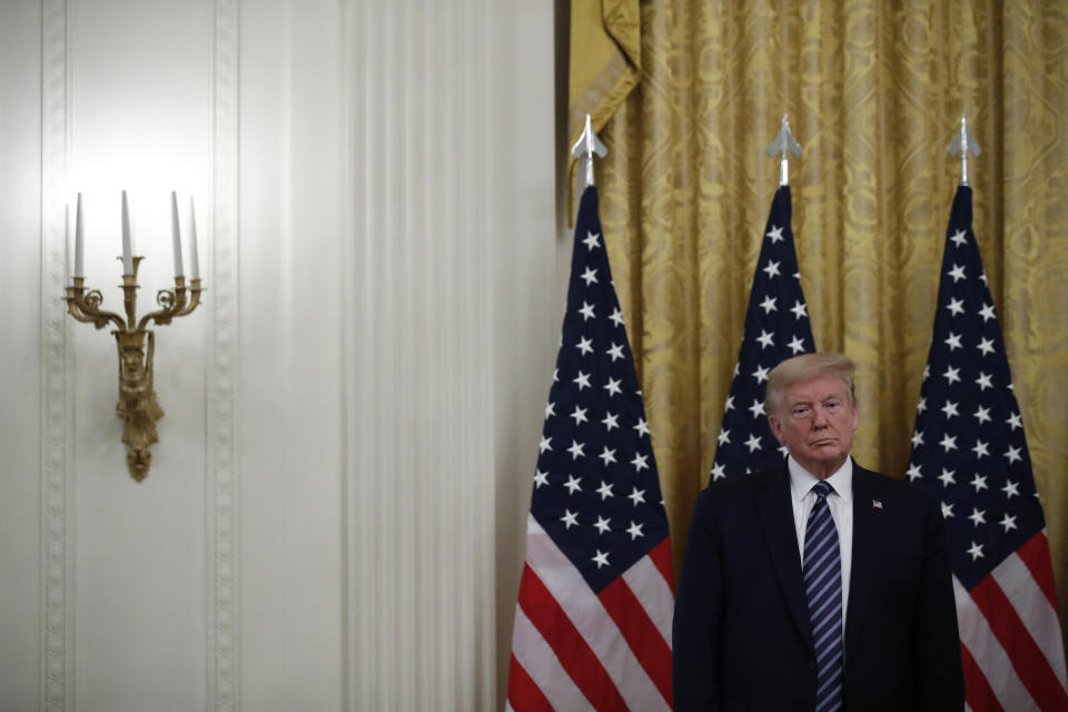 FILE - In this April 30, 2020, file photo President Donald Trump listens as Tennessee Gov. Bill Lee speaks about protecting seniors, in the East Room of the White House in Washington. (AP Photo/Alex Brandon, File)