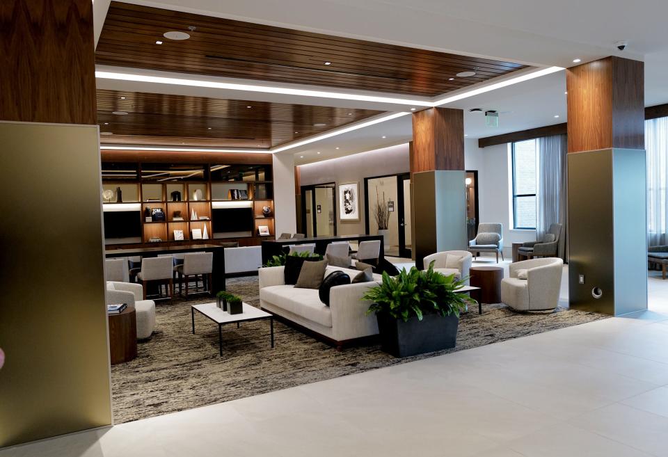 The lobby of the AC Hotel in Lansing is designed to have a more European look than the adjoining Hyatt House Hotel Tuesday, Aug. 22, 2023.