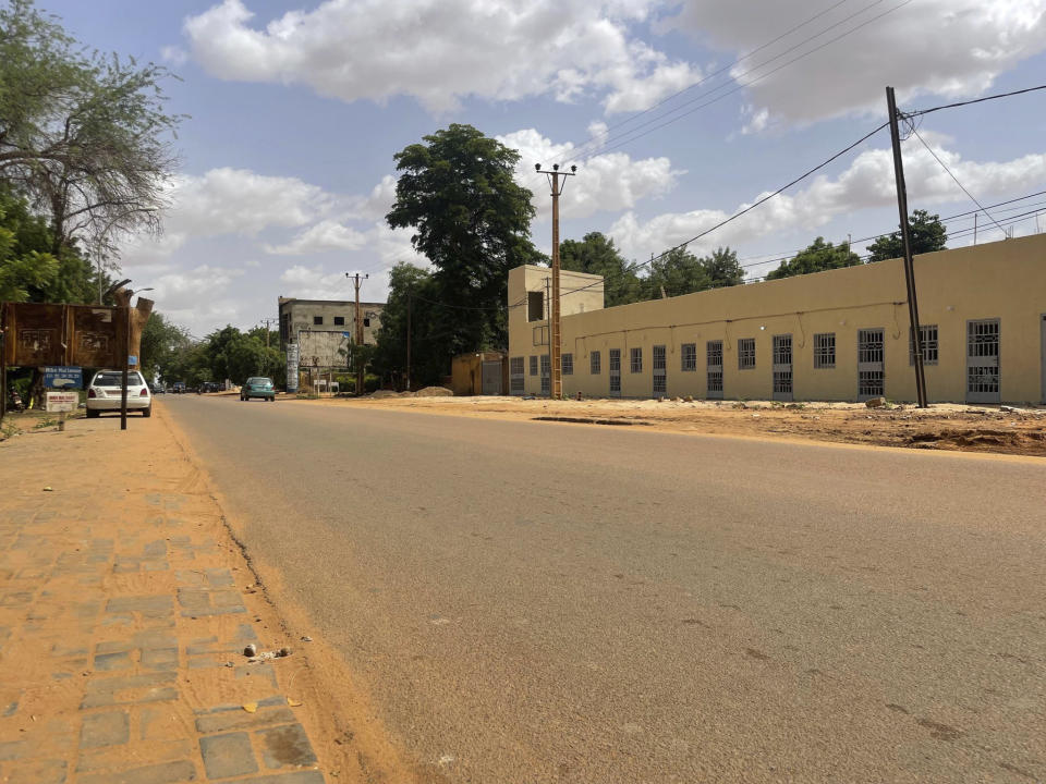 Streets in Niger's capital Niamey are deserted as elements of the presidential guard moved against President Mohamed Bazoum Wednesday July 26 2023. (AP Photo/Sam Mednick)