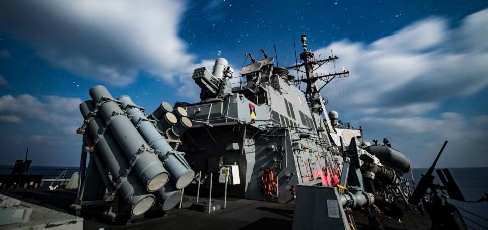 A view of the USS Carney from the stern showing, among other things, its SeaRAM defense system on top of the rear end of its main superstructure. <em>USN</em>