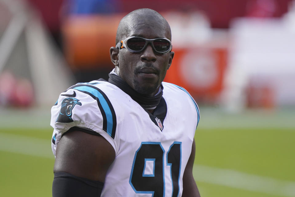 FILE - Carolina Panthers defensive end Stephen Weatherly warms up before an NFL football game against the Kansas City Chiefs in Kansas City, Mo., in this Sunday, Nov. 8, 2020, file photo. The Carolina Panthers are releasing veteran safety Tre Boston, defensive end Stephen Weatherly and punter Michael Palardy in a salary-cap, cost-cutting move, a person familiar with the situation told The Associated Press. The person spoke on condition of anonymity Friday, Feb. 19, 2021, because the moves have not been announced. (AP Photo/Jeff Roberson, File)