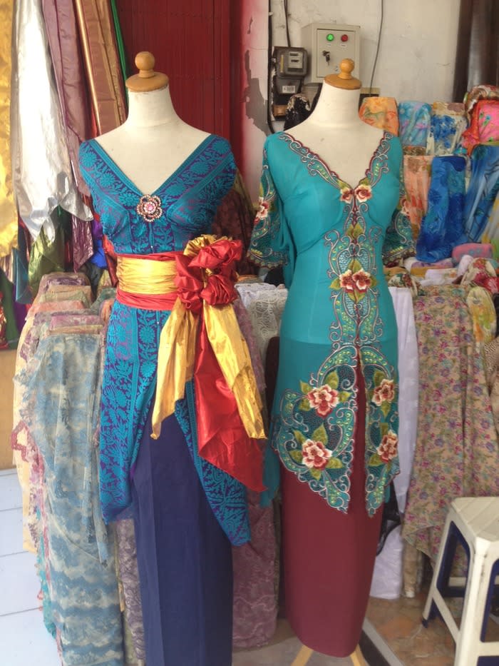 Beauty on display: Traditional "kebaya" dresses in silk and cotton with embroideries on display at one of the shops in Jl. Sulawesi, Denpasar. (