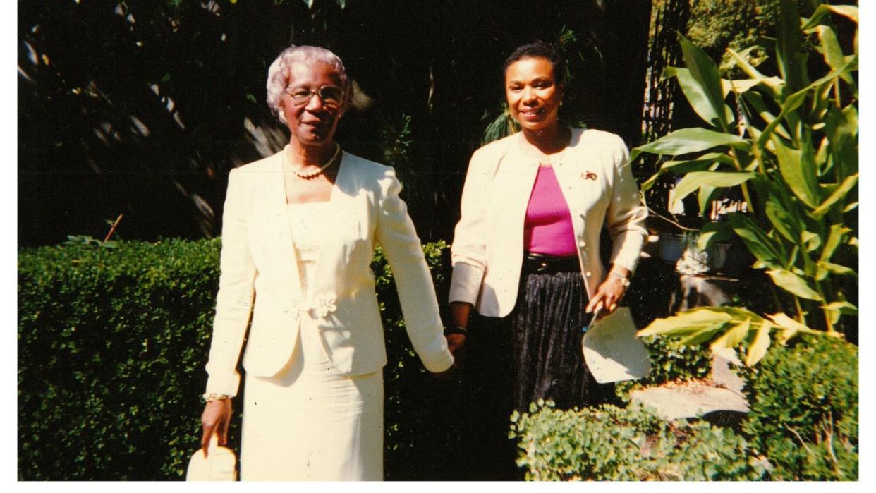 a couple of women posing for the camera