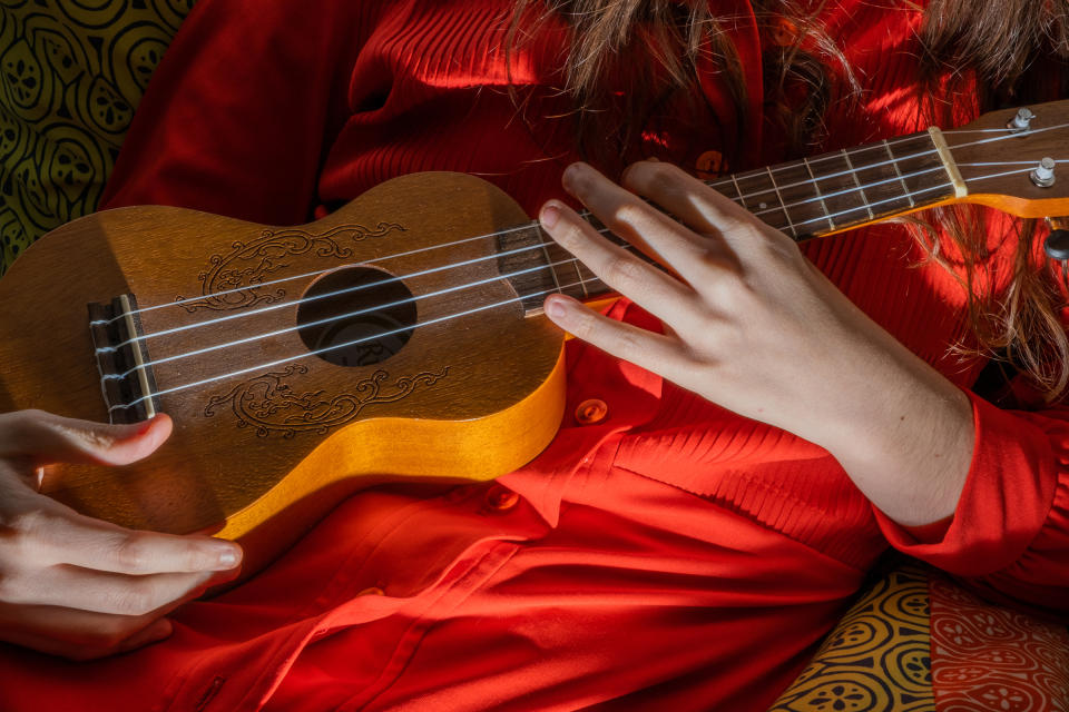 5:27 P.M. Playing the ukulele | Lucia Buricelli for TIME