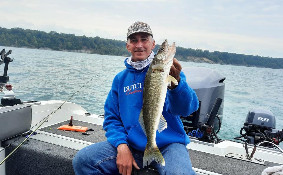 Capt. Keith Eshbaugh holds a walleye caught June 9 in Lake Erie. He said the walleye fishing is going to be great over the next couple of months.