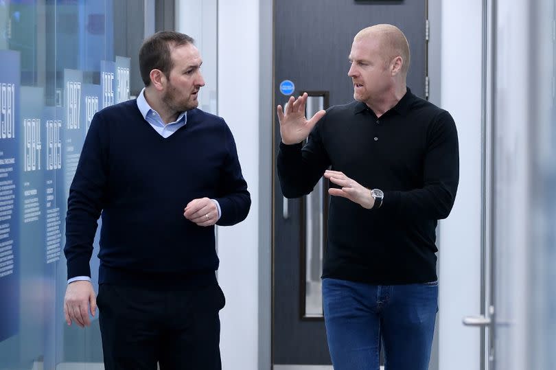 Sean Dyche speaks with Kevin Thelwell (L) after becoming manager of Everton