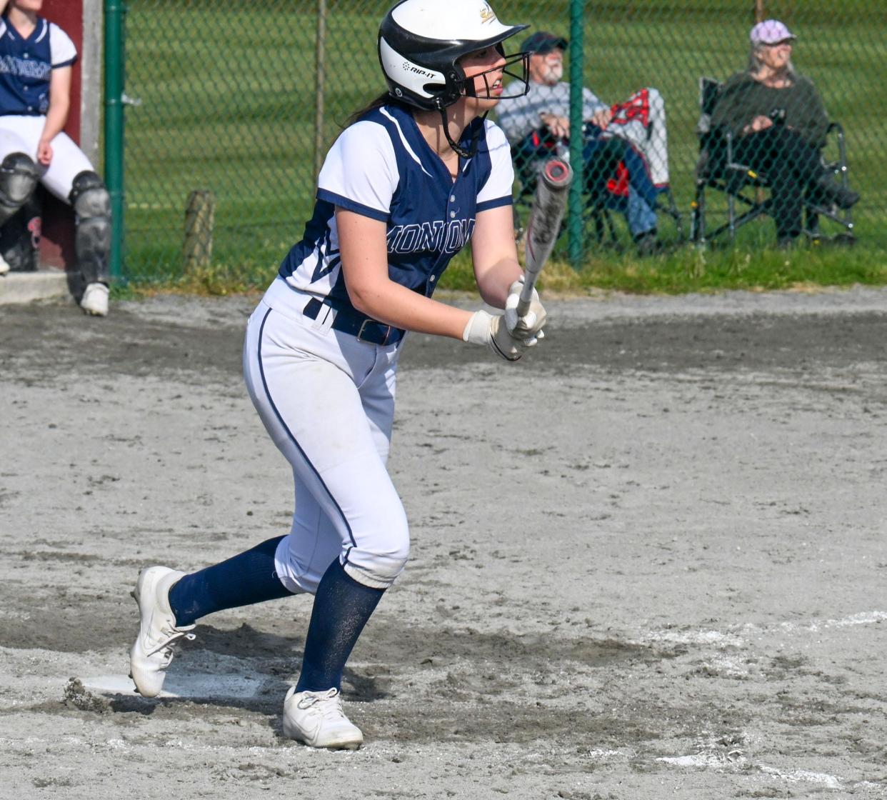 Kiley Mawn of Monomoy gets hold of a Sturgis pitch for a triple late in the game.