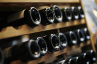 Wine bottle are seen in a wine shop in Paris, Thursday, Oct. 3, 2019. The European Union will retaliate against the U.S. decision to slap tariffs on a range of the bloc's exports - from cheese to wine - that are expected to cause job losses, governments and industry groups said Thursday. (AP Photo/Kamil Zihnioglu)