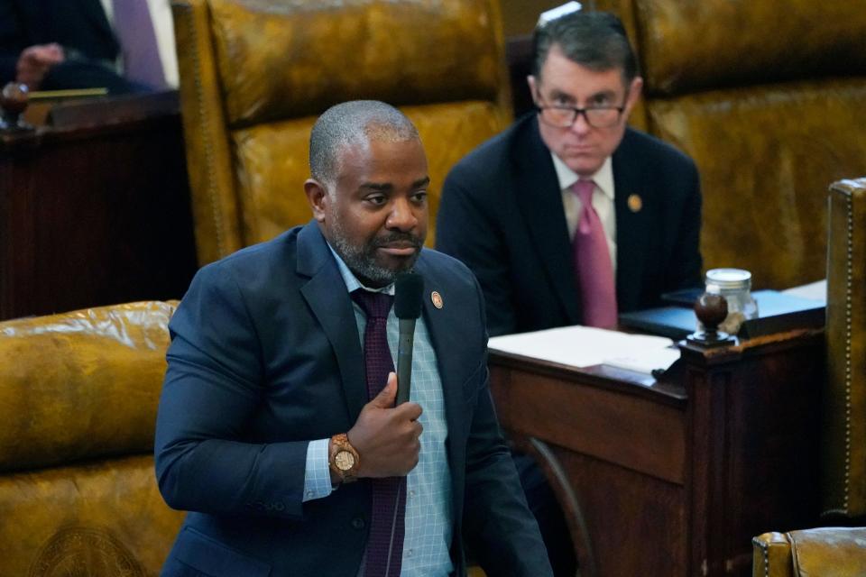 Rep. Ronnie Crudup Jr., D-Jackson, asks a question about House Bill 1020 that would create a separate court system in the Capitol Complex Improvement District, as Rep. Jody Steverson, R-Ripley, listens, right, Tuesday, Feb. 7, at the Mississippi Capitol in Jackson.