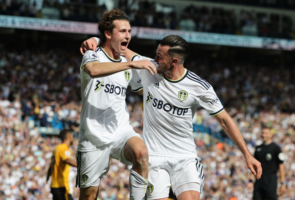 LEEDS, ENGLAND - AUGUST 06: Brenden Aaronson of Leeds United celebrates scoring their sides second goal with teammate Jack Harrison during the Premier League match between Leeds United and Wolverhampton Wanderers at Elland Road on August 06, 2022 in Leeds, England. (Photo by David Rogers/Getty Images)