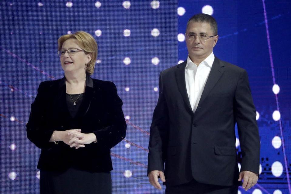 Russia's Healthcare Minister Veronika Skvortsova (left) and doctor Alexander Myasnikov attend the Volunteer of Russia 2019 award ceremony as part of the International Volunteer Forum at Shayba Arena.