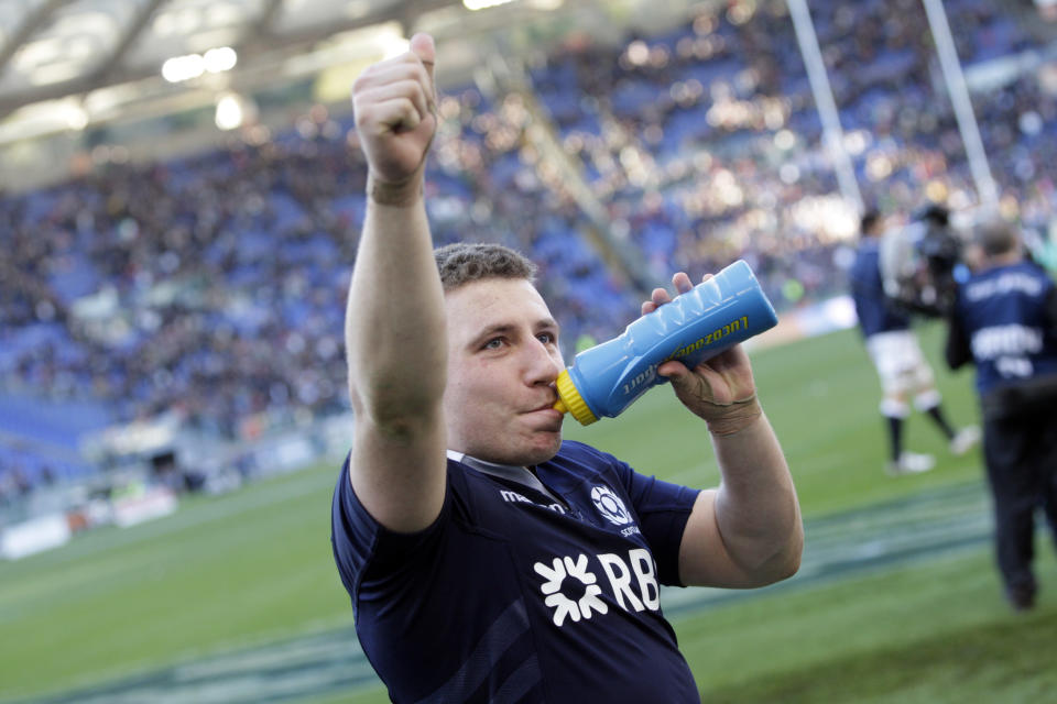 Scotland's Duncan Weir greets supporters at the end of a Six Nations rugby union international match between Italy and Scotland, in Rome, Saturday, Feb. 22, 2014. Scotland won 21-20. (AP Photo/Andrew Medichini)