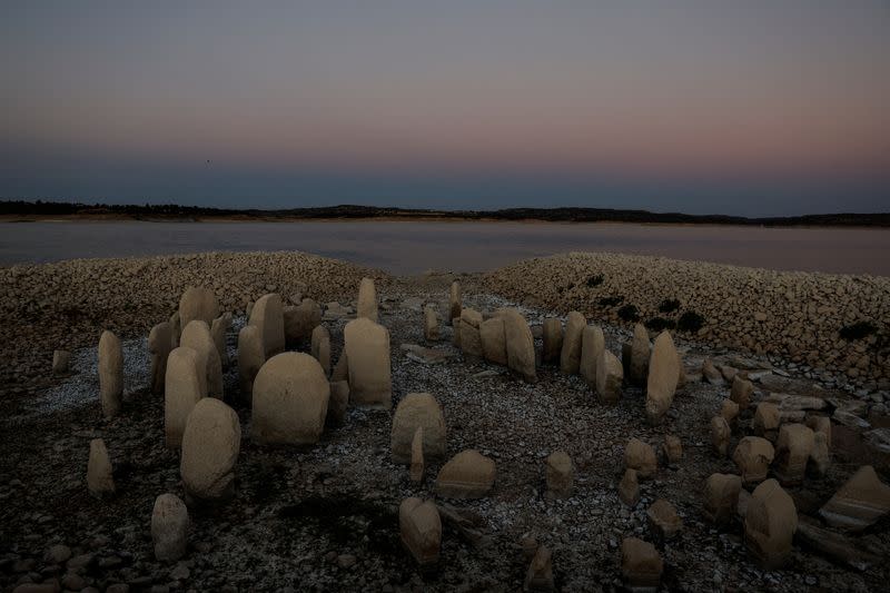 FILE PHOTO: The dolmen of Guadalperal, also known as the Spanish Stonehenge, is seen due to the receding waters of the Valdecanas reservoir in the outskirts of El Gordo