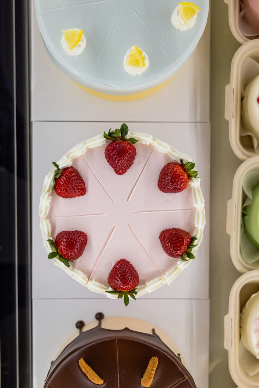 Three round cakes in Harucake's cake display case.