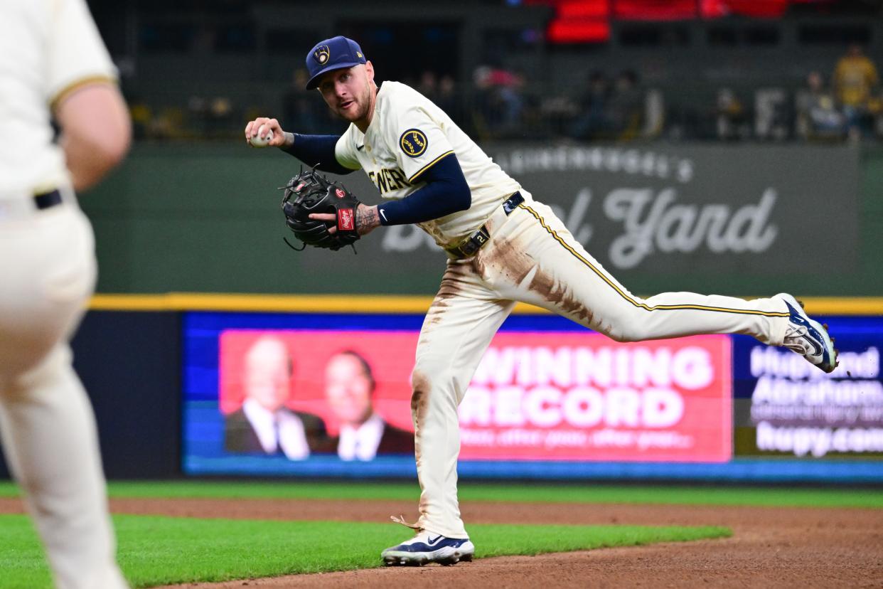 Apr 17, 2024; Milwaukee, Wisconsin, USA; Milwaukee Brewers second baseman Brice Turang (2) throws out San Diego Padres left fielder Jurickson Profar (not pictured) in the ninth inning at American Family Field. Mandatory Credit: Benny Sieu-USA TODAY Sports