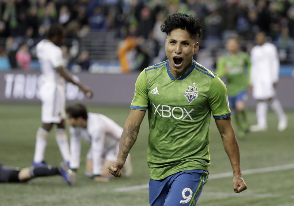 A cruel fate: Raul Ruidiaz was all smiles after scoring in Thursday’s thrilling playoff match against the rival Portland Timbers, but his Seattle Sounders were eliminated on penalties. (Ted S. Warren/AP)