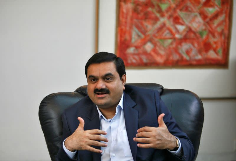 FILE PHOTO: Indian billionaire Gautam Adani speaks during an interview in Ahmedabad