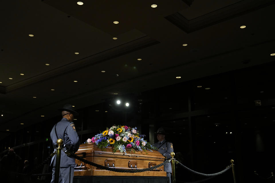 A Georgia State Patrol honor guard stands as members of the public pay respects to former first lady Rosalynn Carter at the Jimmy Carter Presidential Library and Museum in Atlanta, Monday, Nov. 27, 2023, during the public repose. (AP Photo/Brynn Anderson, Pool)