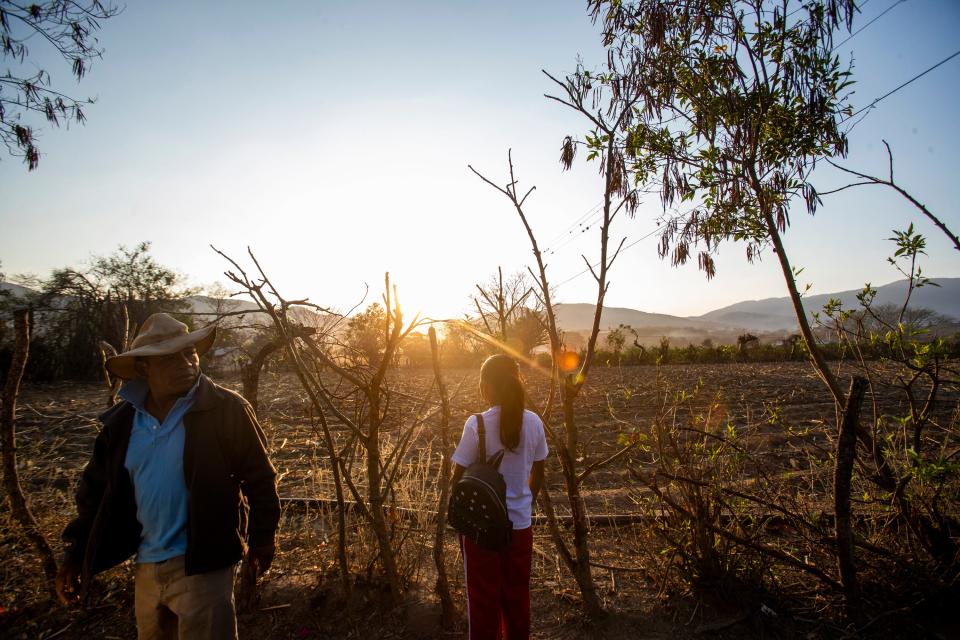 Francisco Sical gets ready to walk his daughter Melissa to school in Baja Verapaz, Guatemala, in March.