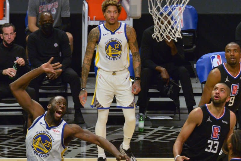 Golden State Warriors forward Draymond Green (L) averaged 9.2 points per game over 27 appearances this season. File Photo by Jim Ruymen/UPI