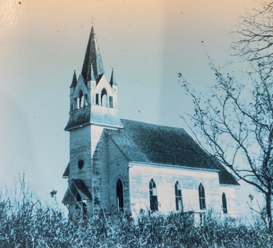 A black-and-white photograph of a chapel in Minnesota built in 1909.