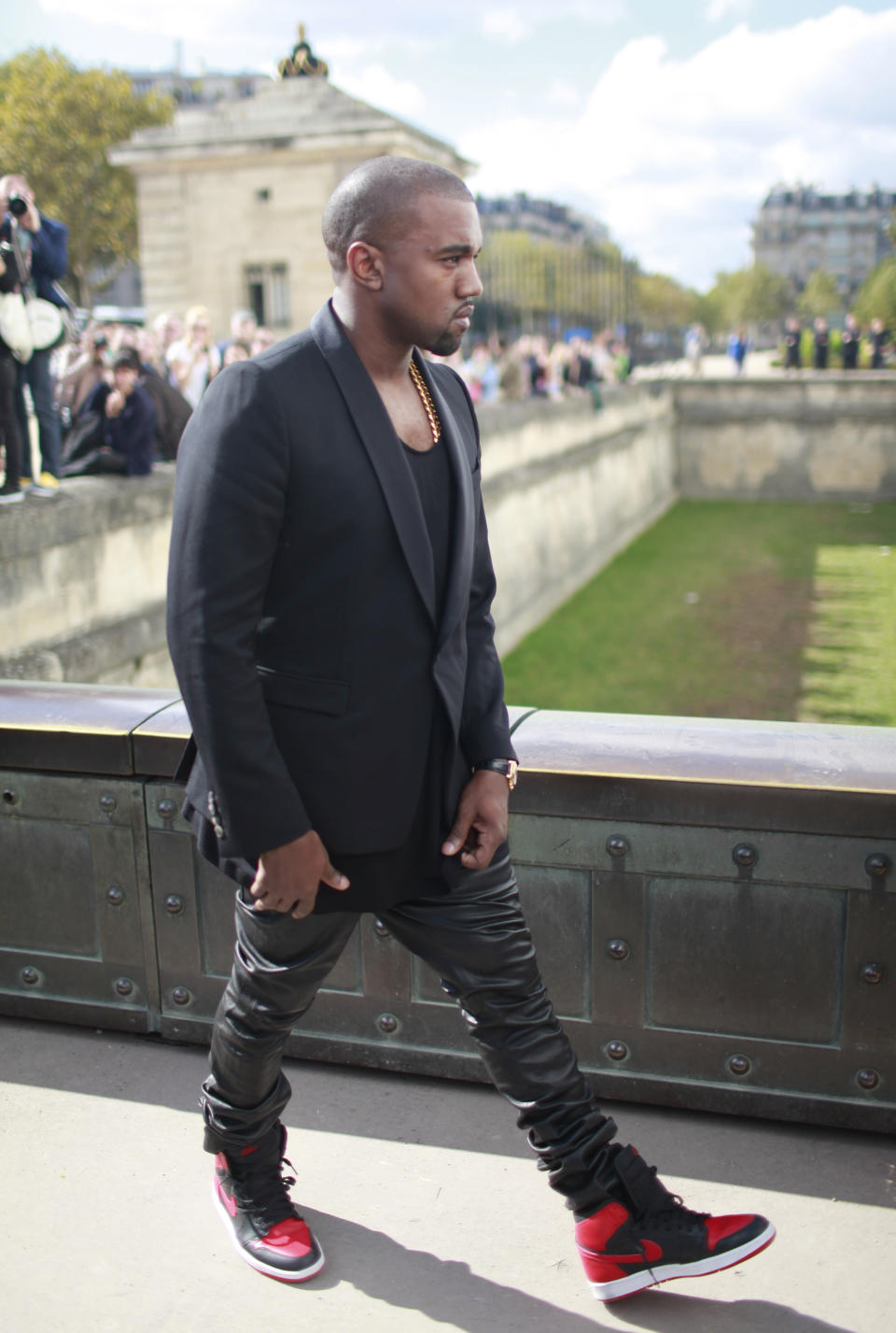 US rap artist Kanye West arrives for the presentation of Christian Dior's ready to wear Spring-Summer 2013 collection, in Paris, Friday, Sept.28, 2012. (AP Photo/Thibault Camus)