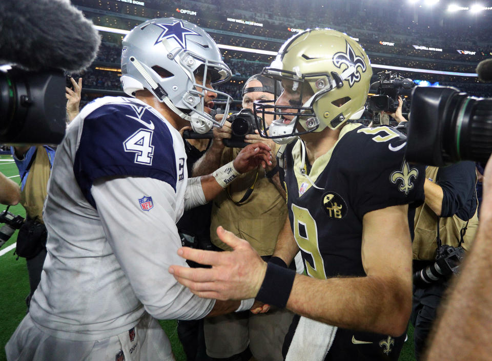 ARLINGTON, TEXAS - NOVEMBER 29: Dak Prescott #4 of the Dallas Cowboys shakes hands with Drew Brees #9 of the New Orleans Saints after the Cowboys 13-10 win at AT&T Stadium on November 29, 2018 in Arlington, Texas. (Photo by Richard Rodriguez/Getty Images)