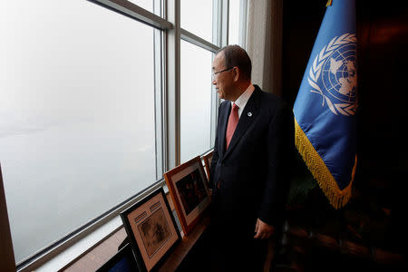 United Nations Secretary General Ban Ki-moon looks out his window as he poses for a portrait in his office at United Nations Headquarters in the Manhattan borough of New York, New York, U.S., October 21, 2016. REUTERS/Carlo Allegri