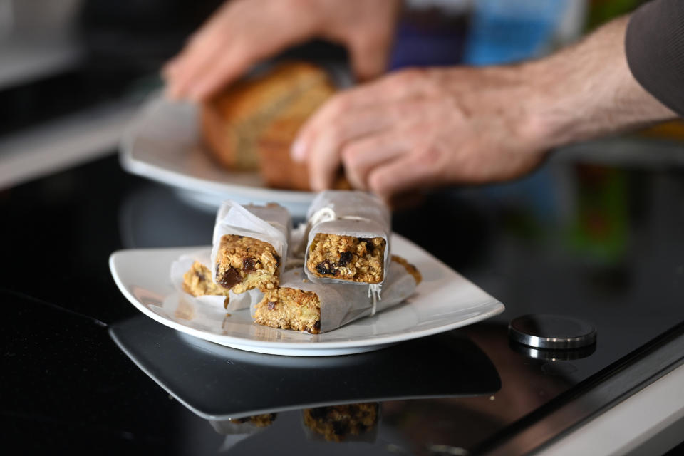 Homemade apple crumble bars stacked on a plate