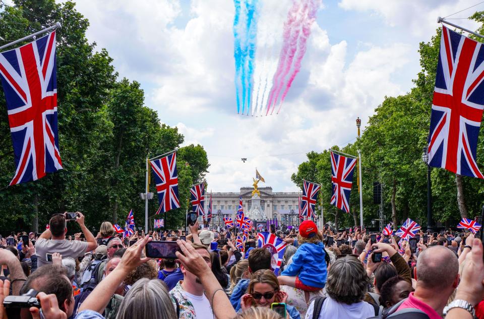 The crowd gathers along the Mall in London, the United Kingdom during the Flypast for the Queen's Platinum Jubilee celebration on June 2, 2022. (Photo by Alexander Mak/NurPhoto)