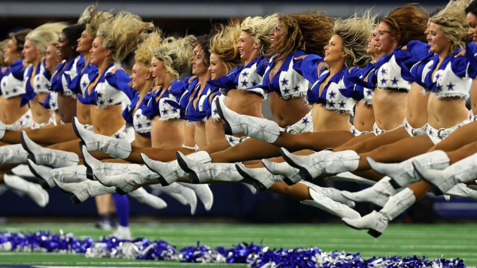 <div>ARLINGTON, TEXAS - JANUARY 14: The Dallas Cowboys Cheerleaders perform before the game against the Green Bay Packers at AT&T Stadium on January 14, 2024 in Arlington, Texas. (Photo by Richard Rodriguez/Getty Images)</div>