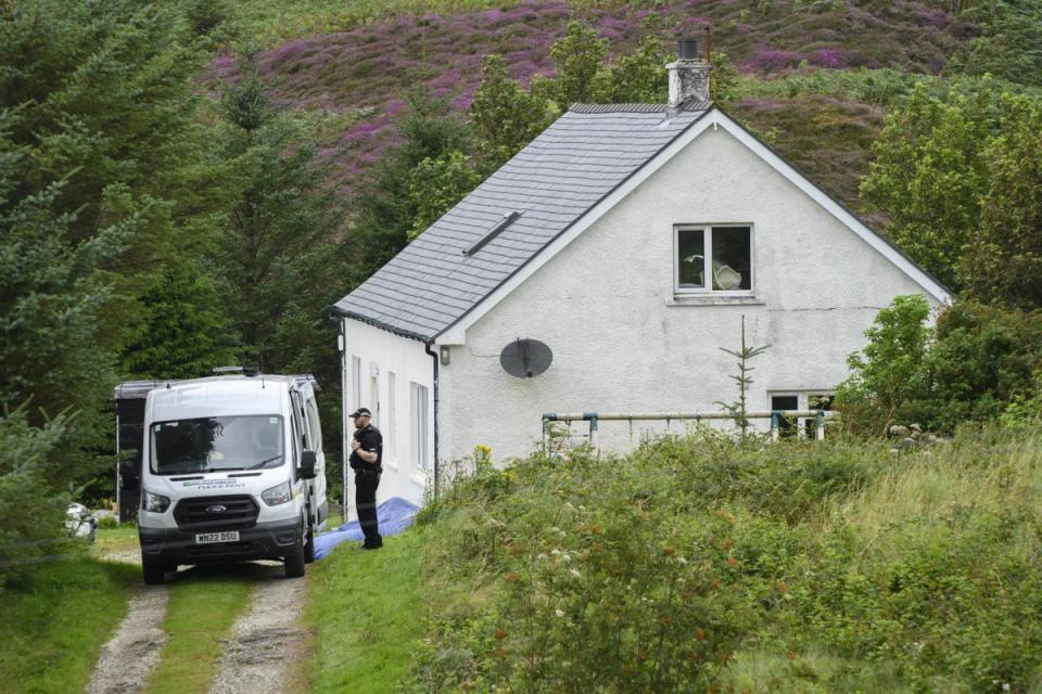 Police at the scene of the incident in Tarskavaig (John Linton/PA) (PA Wire)