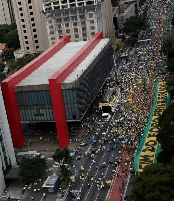 Demonstrators march along Paulista Avenue in Sao Paulo, Brazil, on March 26, 2017 during a nationwide protest against political corruption