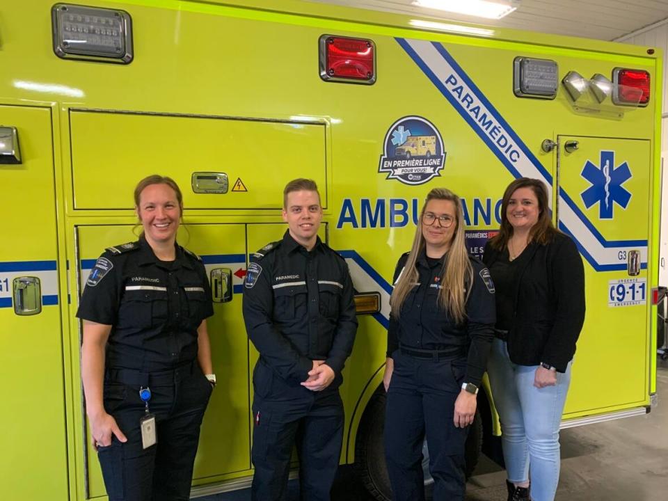 The CTAQ ambulance co-operative is looking for soothing art submissions. Part of a pilot project launched by paramedic Julie Dubuc (far left), the art will be installed in ambulances to give patients something peaceful to look at. (Submitted by Dave Kidd - image credit)