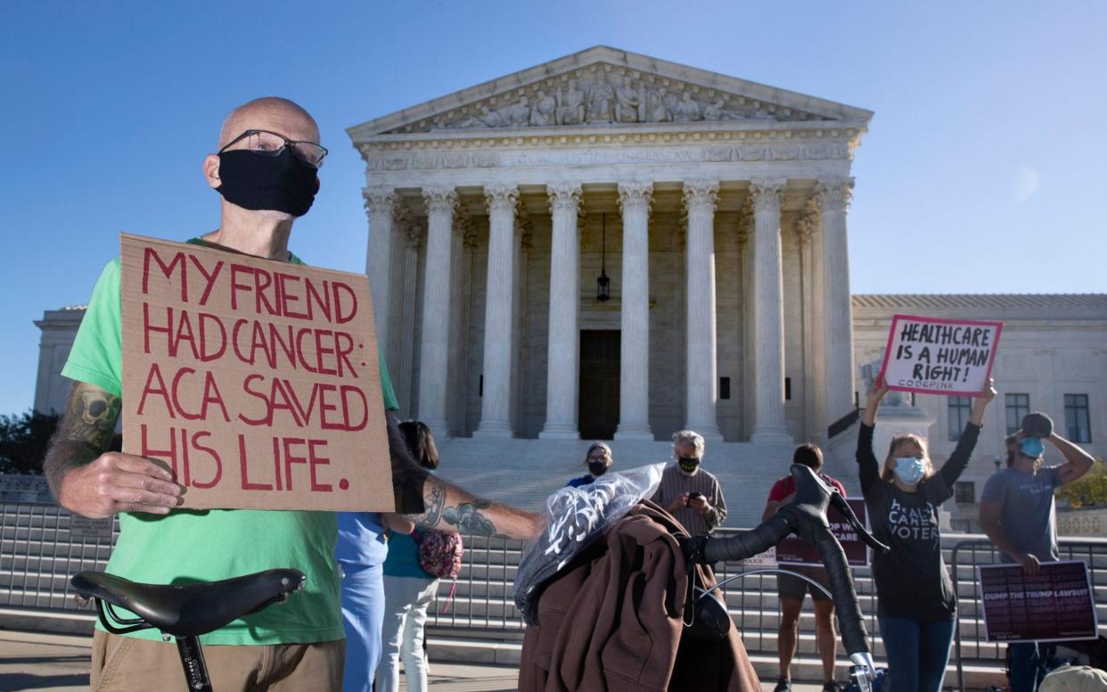 Supporters of the Affordable Care Act (ACA) demonstrate outside the US Supreme Court, Washington, USA  - EPA