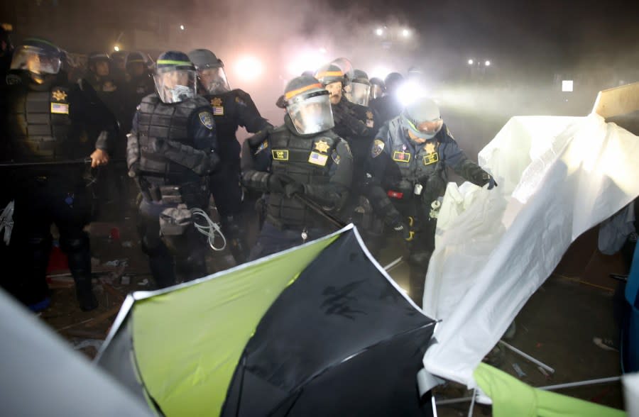 LOS ANGELES CA MAY 2, 2024 — Police near the protestors’ encampment on the UCLA campus Thursday, May 2, 2024. (Jason Armond / Los Angeles Times via Getty Images)