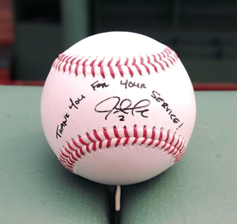 An example of the inscription on a signed baseball Justin Turner gives to a veteran or service member at every game.