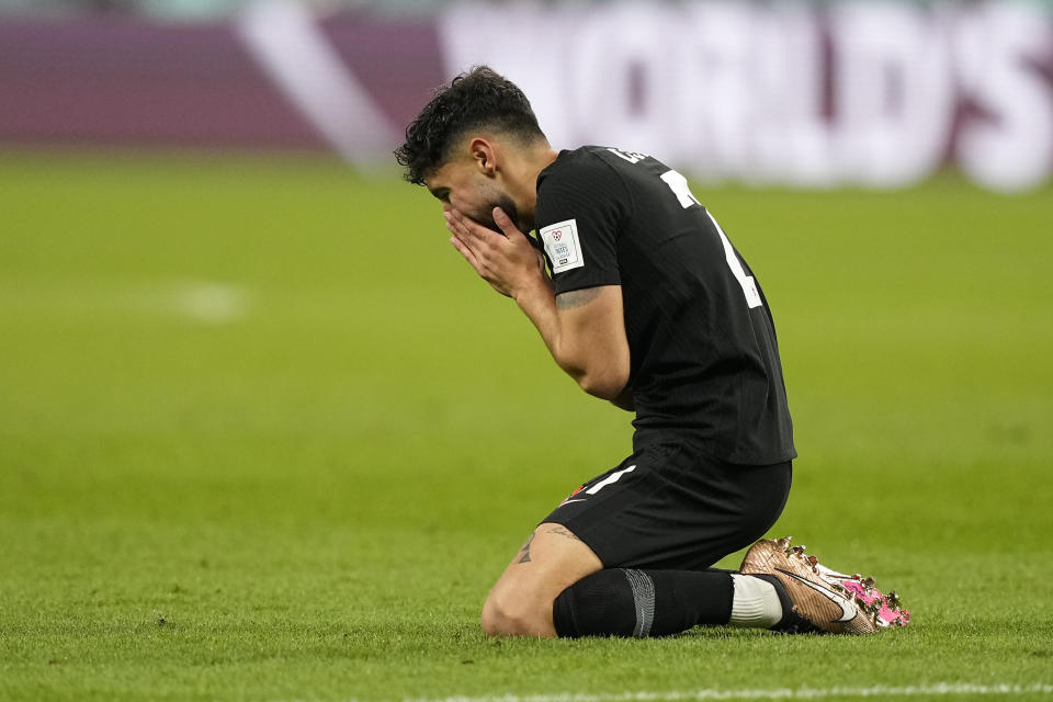 Canada's Jonathan Osorio reacts during the World Cup group F soccer match between Croatia and Canada, at the Khalifa International Stadium in Doha, Qatar, Sunday, Nov. 27, 2022. (AP Photo/Martin Meissner)