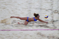 LONDON, ENGLAND - JULY 28: Vasiliki Arvaniti of Greece dives for the ball against Switzerland during the Women's Beach Volleyball Preliminary Round between Switzerland and Greece on Day 1 of the London 2012 Olympic Games at Horse Guards Parade on July 28, 2012 in London, England. (Photo by Ryan Pierse/Getty Images)