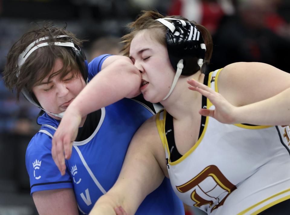 Pleasant Grove’s Meghan Butt, left, wrestles Davis’ Finnley Gilligan in the 6A State Championships at Utah Valley University in Orem on Wednesday, Feb. 14, 2024. | Laura Seitz, Deseret News