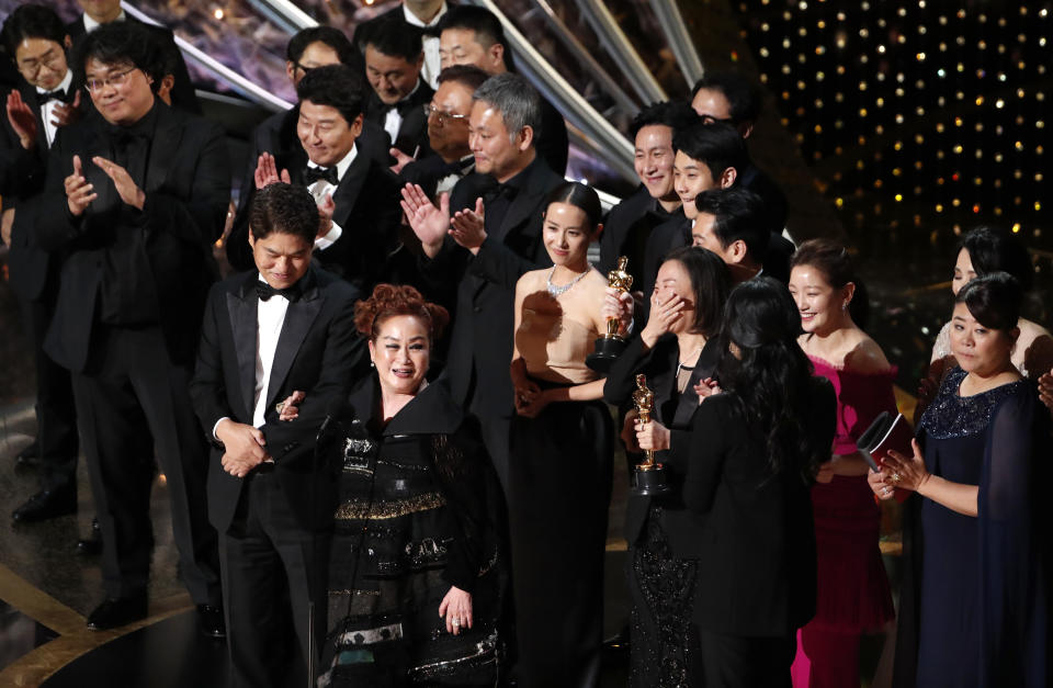 Miky Lee, Kwak Sin Ae and Bong Joon Ho react after winning the Oscar for Best Picture for "Parasite" at the 92nd Academy Awards in Hollywood, Los Angeles, California, U.S., February 9, 2020. REUTERS/Mario Anzuoni