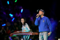 U.S. singer Pharrell Williams and Hong Kong singer Karen Mok perform during Alibaba Group's 11.11 Singles' Day global shopping festival in Shanghai, China, November 10, 2017. REUTERS/Aly Song