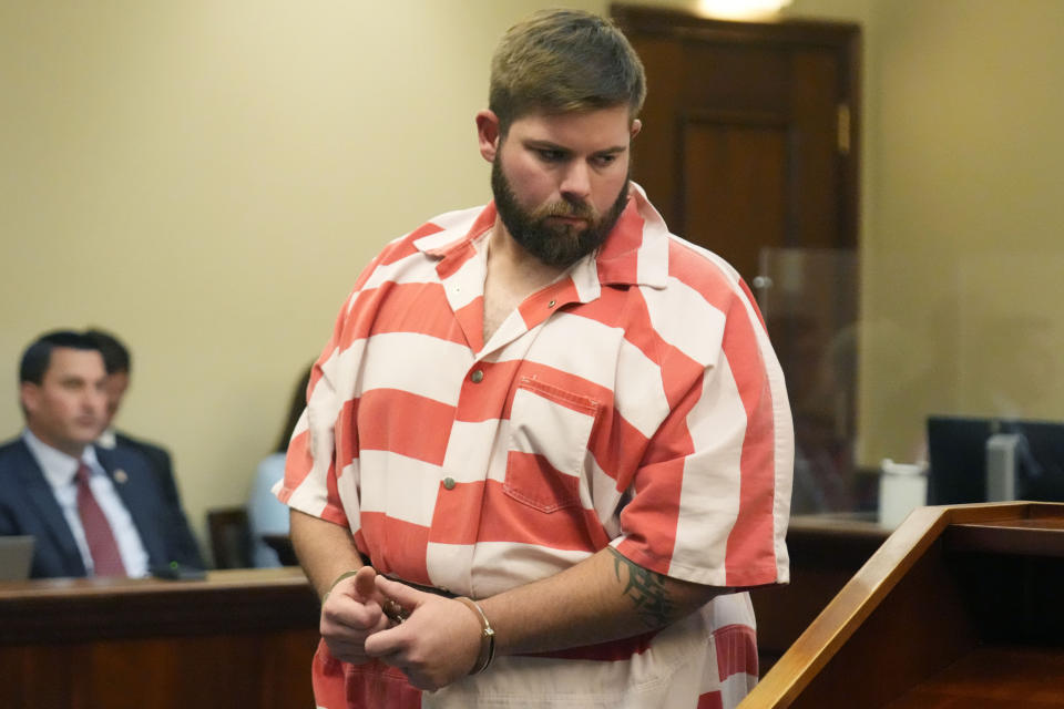 Former Rankin County sheriff’s deputy Daniel Opdyke appears in the Rankin County Circuit Court in Brandon, Miss., Monday, Aug. 14, 2023. Opdyke is one of six white former Mississippi law officers that pleaded guilty to state charges on Monday for torturing two Black men in a racist assault. All six had recently admitted their guilt in a connected federal civil rights case. (AP Photo/Rogelio V. Solis)