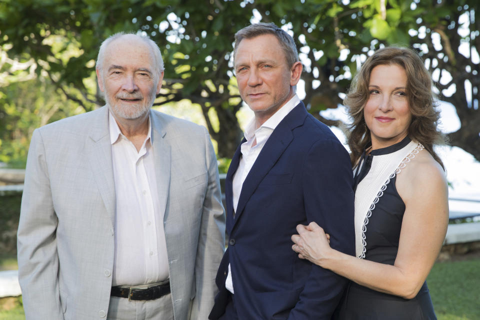 Producers Michael G Wilson, left, and Barbara Broccoli, right, with actor Daniel Craig during the photo call of the latest installment of the James Bond film franchise. (AP Photo/Leo Hudson)